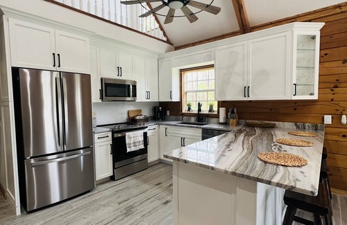 North Port Cabina | One of a kind, real log home in southwest Florida!