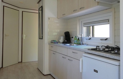 Marum Chalet De Esquí | Op de grens van Friesland,Groningen en Drenthe,direct tegen bos gelegen