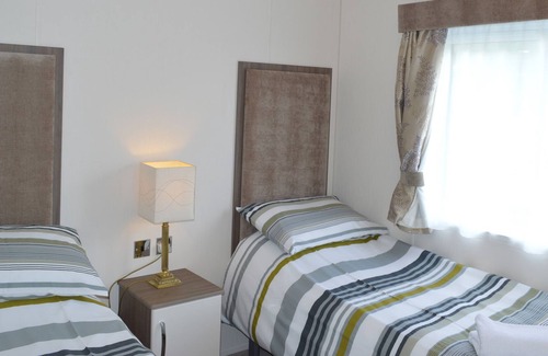 Slate Islands Cabina | ORCHID LODGE, pet friendly, country holiday cottage in Oban