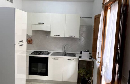 Nulvi Apartamento | Osiris house with private garden and barbecue