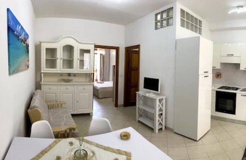 Nulvi Apartamento | Osiris house with private garden and barbecue