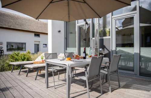 Heiligenhafen Casa | Ostsee - Reetdachhaus Nr 13 "Reethaus am Yachthafen" im Strand Resort