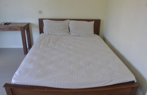 Langowan Hotel | OYO 92880 Wisma Nusantara Near SD GMIM Wiau Lapi