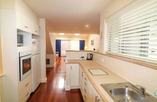 Cams Wharf Villa | 23 Oystercatcher Executive Resort Villa situada en Raffertys Resort