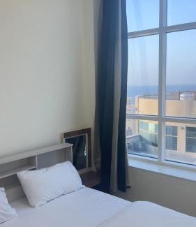 Ajman Casa | P3) Fantastic Seaview Room with shared bath inside 3bedroom apartment