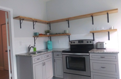 Southwest Cabaña | Palm beach cottage in zen tropical setting near beach & shops.
