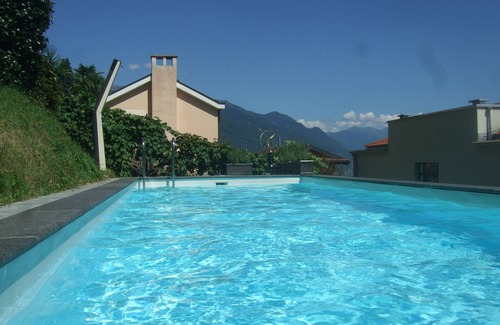 Orselina Apartamento | Experiencia árboles de palma, piscina y panorámica: Casa Belsito, Orselina, Lago Mayor