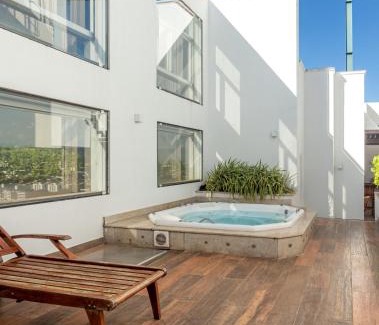Plano Diretor Sul Apartamento | PALMAS EXPERIENCE - FLAT ACONCHEGANTE no centro