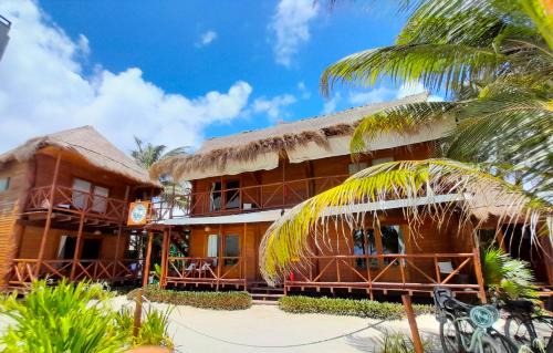Mahahual Cabina | Palmeras de Mahahual Cabañas