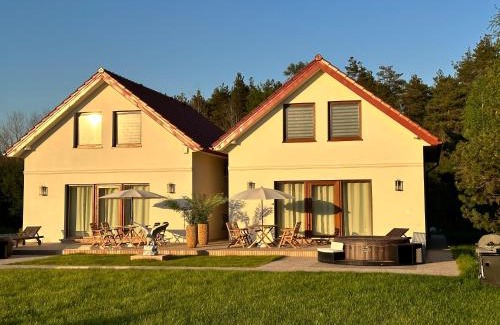 Sarbsk Casa | PANORAMA LASU komfortowe domy z jacuzzi Łeba-Nowęcin