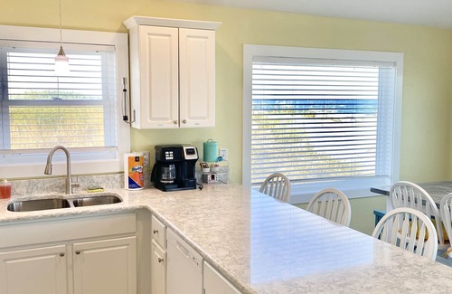 Sea Retreat Casa | Panoramic Ocean Views in this Updated Vintage Beach Box Right on the Beach!