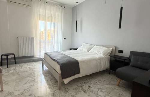 Magna Grecia Cama Y Desayuno | Panta Rei Charming Rooms and Spa bright Iris room with balcony