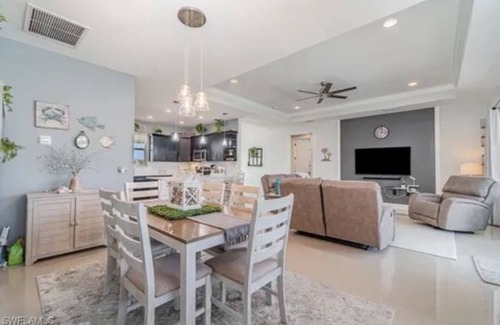Trafalgar Casa | Paradise of Cape Coral on Canal, with Heated Pool, Tiki Hut Grill & Elec Bikes