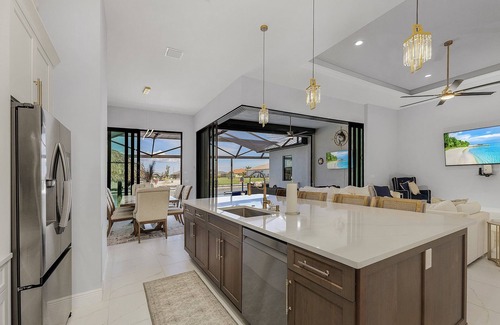 Burnt Store Casa | Paradise Tiki: Gulf Access, Tiki Bar, Pool & Spa! Spacious 5 bedroom home!