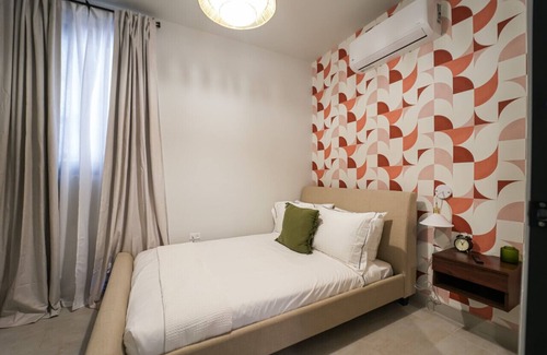Santurce Hotel | Patio Elba Master 2 Bedroom Suite Outdoor Seating