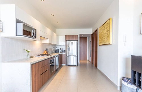 Bucerias Condominio | PAVILION 2BR, Rooftop Infinity Pool & Jacuzzi with AMAZING views of the ocean.