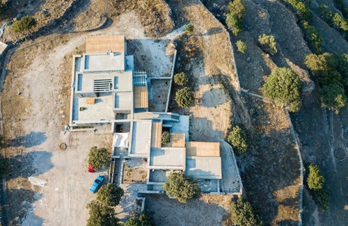 Nisyros Apartamento | Pavlaina Complex of Traditional Residences in Nisyros. Enjoy the garden and the Sea View