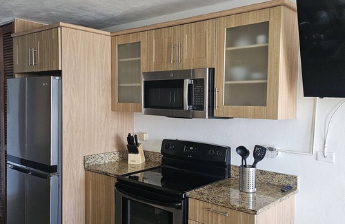 Cabezas Condominio | Entorno de resort con todas las comodidades del hogar - Peña Mar! A / C, TV, WiFi