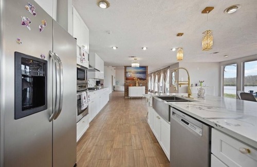 College Park Casa | Peace and beauty lake view of Many and large glass windows. All new furnitures!