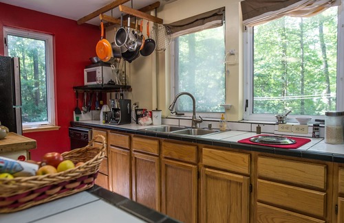 Southeast Raleigh Casa | Paz y privacidad en un hogar de estilo colonial holandés