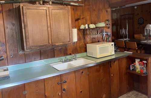 Cross Lanes Cabina | Peaceful fishin’ camp on a lake, bring your dog, and fishing pole.