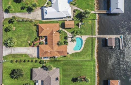 Northside Casa | Peaceful Island Retreat - Heated Pool - Gym - Private Dock