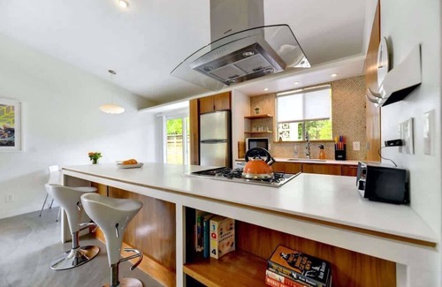 South River City Casa | Mid-Century Modern near SoCo + DT by Lodgewell