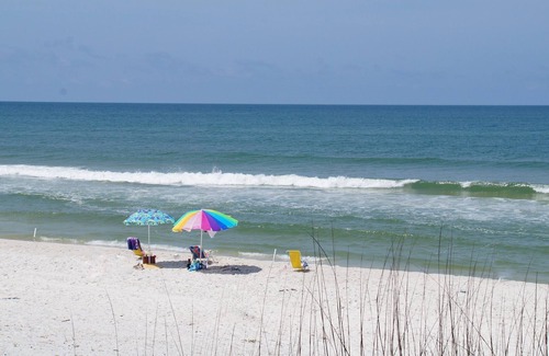 Port St. Joe Cabaña | "Pelican Cottage" is a pet friendly, 2 bed, 1 1/2 bath unit accepting 5 guests. Pool Coming 2025!