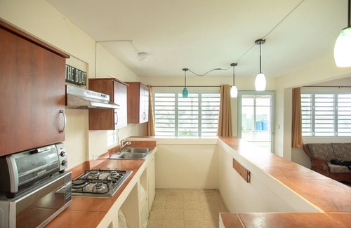 Rio Grande Cama Y Desayuno | PELICAN REEF BEACHFRONT 2 BED 1 BATH A/C ON SMALL FARM, SURF RIGHT OUT FRONT
