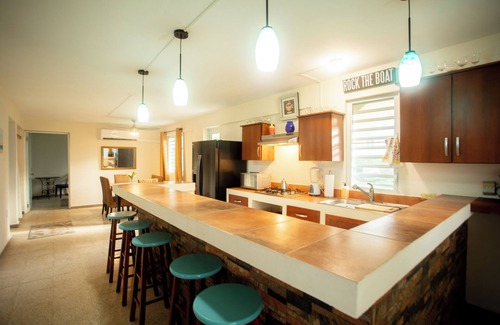 Rio Grande Cama Y Desayuno | PELICAN REEF BEACHFRONT 2 BED 1 BATH A/C ON SMALL FARM, SURF RIGHT OUT FRONT