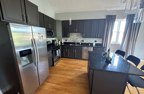 Grand Boulevard Condominio | Penthouse Condo in Chicago featuring Zero Gravity Massage Chair