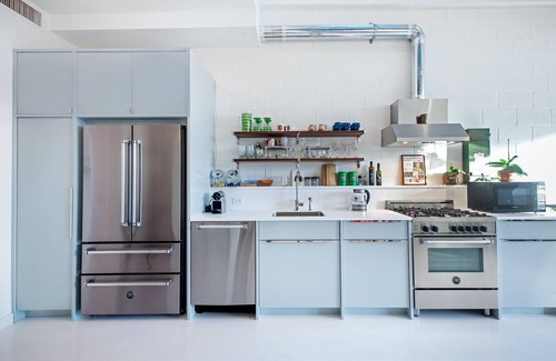 Hunters Point Casa | Penthouse w/ large rooftop Manhattan skyline in 2 family Townhome