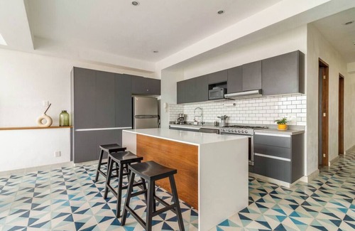 Americana Condominio | Penthouse with private rooftop and panoramic views