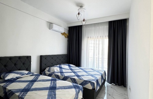 Esentepe Casa | penthouse with rooftop, 2 balcony ocean & mountain view pool beachfront BBQ wifi