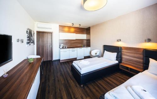 Olomouc Casa | Penzion v jízdárně