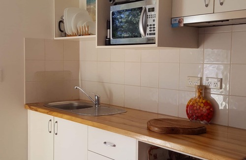 Kings Forest Apartamento | Pet Friendly Accommodation Kingslciff Queen size, selva tropical y terrenos para mascotas