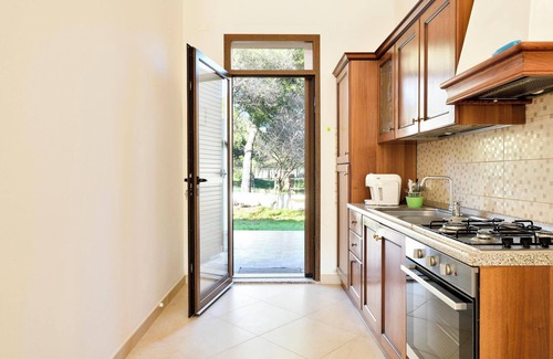 Cardedu Apartamento | Apartamento que admite mascotas "Casa Museddu" con aire acondicionado, terrazas y jardín