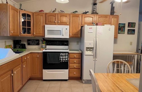 Broadkill Beach Casa | Pet friendly, Broadkill Beach rental with a large screened in area and open deck!