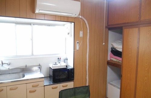Minato Casa | Pet friendly, close to USJ and the planned Expo site. Wooden log house style rooms