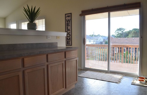 Colington Casa | Pet Friendly Home with Private Tiki Bar - 3-minute drive to the beach!
