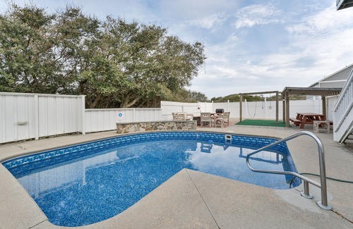 Sea Scape Casa | Pet-friendly Kitty Hawk home with private heated pool, volleyball court, and more