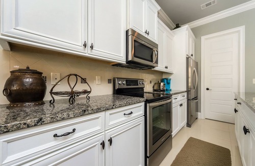 Villa Lago Casa | Pet Friendly ~ Water View ~ 2 Golf Carts ~ Community Pool