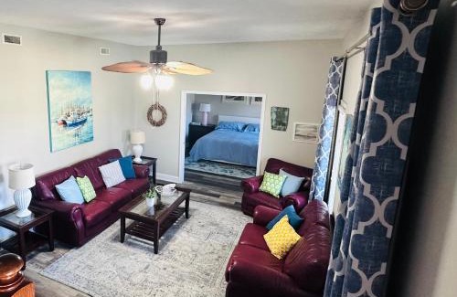 Cedar Point Casa | Pets welcome in a spacious 1 bedroom with a fenced in backyard and treadmill