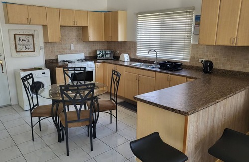 Caribbean Estates Casa | Petulia's Place- A cozy 2 bedroom retreat in a gated community in Portmore.