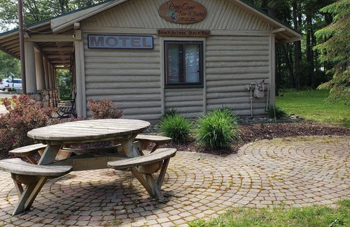Gaylord Casa | Pine Cone Inn - Room M9 with 2 Double beds located across from Otsego Lake.