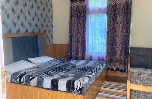 Kullu Cabina | Pinewood by Damson, a hillside lodge in Parvati that beholds a matchless view
