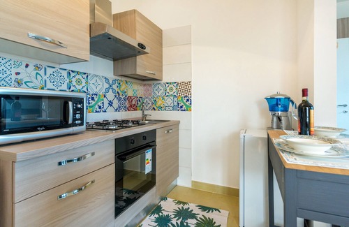 Torre Lapillo Villa | Villino Rose: apartamento estudio finamente amueblado con gran jardín.