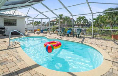 Bal Harbour Casa | Pirates Den a 4BR Pet-Friendly Waterfront Oasis with Pool, Dock, Personal Water Boats, Fire Pit, Game Room and Bar