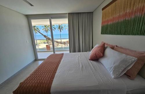 Barra do Sirinhaem Casa | Piscina aquecida, 5 suítes e pé na areia com vista espetacular!