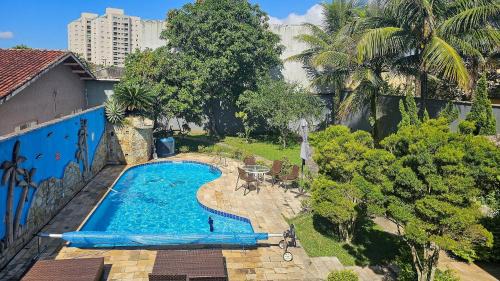 Praia dos Sonhos Casa | Piscina Aquecida, 5 suítes, Bilhar, Varanda Gourmet, 100mts mar